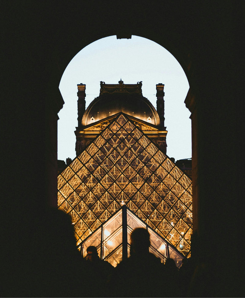 The Louvre pyramid at dusk, the art of a daily sunscreen ritual